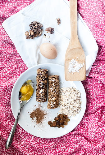 Healthy Breakfast Bars with Oats, Nuts, and Egg on White Plate