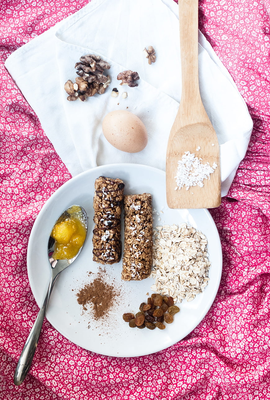 Healthy Breakfast Bars with Oats, Nuts, and Egg on White Plate