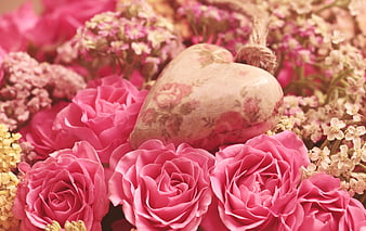 Pink Roses And Heart-Shaped Stone In Romantic Floral Arrangement