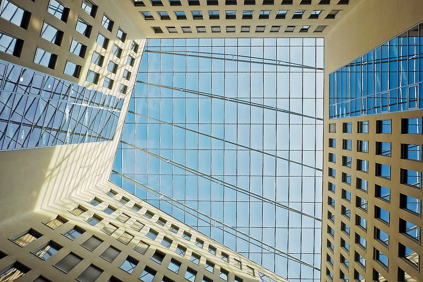 Worm's Eye View of Modern Glass Skyscraper Architecture