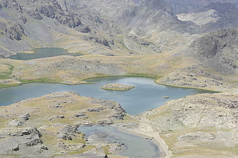 Aerial view of alpine lakes in rocky mountain valley