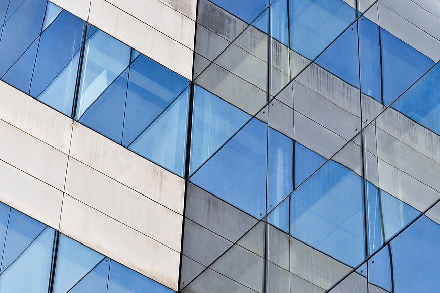 Modern Glass and Concrete Building Facade Architecture