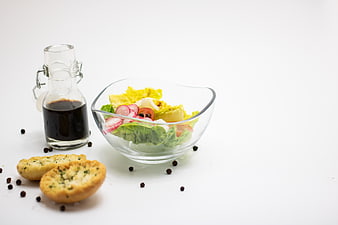 Fresh vegetable salad with garlic bread and dressing