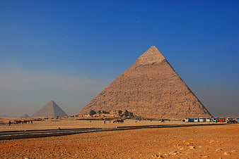 Giza Pyramids in Egypt with clear blue sky and desert landscape