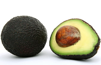 Fresh Whole and Halved Avocado on White Background