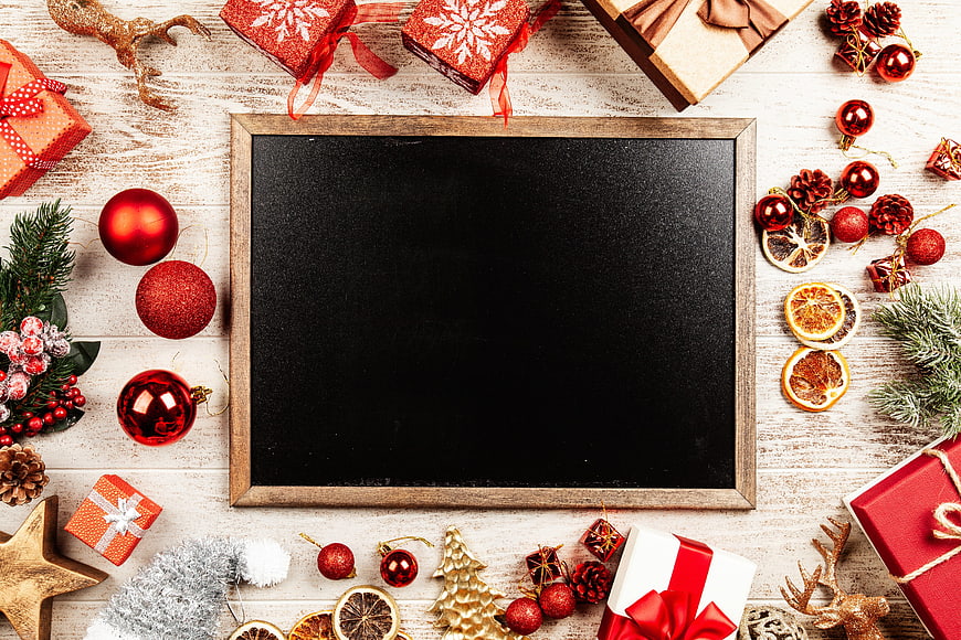 Christmas Flat Lay With Blackboard Copyspace And Holiday Decorations