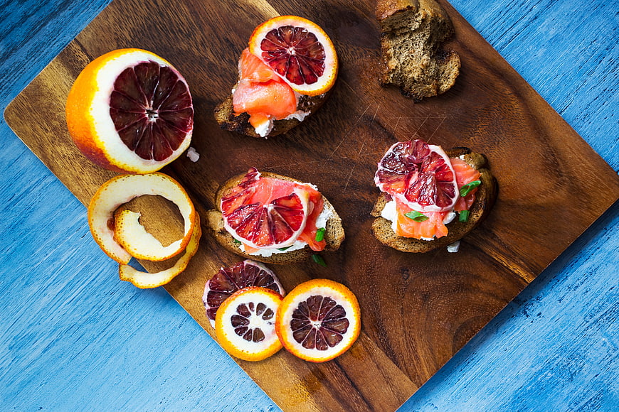 Blood Orange and Salmon Bruschetta on Wooden Board