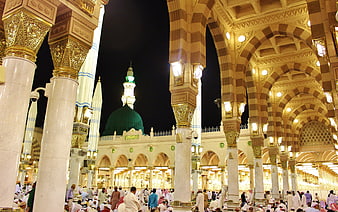 Grand Mosque Interior With Green Dome And Praying Crowd