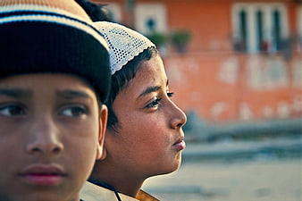 Portrait of Two Young Boys Wearing Knit Caps Outdoors