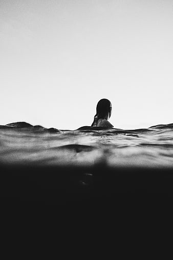 Woman Swimming in Ocean Black and White Silhouette