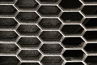 Close-up of textured hexagonal metal mesh pattern
