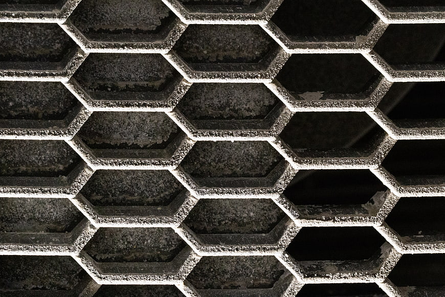 Close-up of textured hexagonal metal mesh pattern