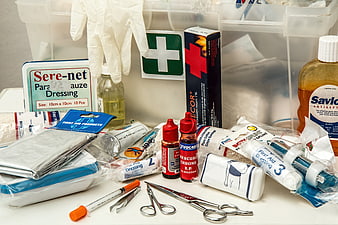 Assorted First Aid Supplies And Medical Emergency Kit Items