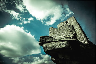 Dramatic Low Angle View of Ancient Stone Castle Ruins