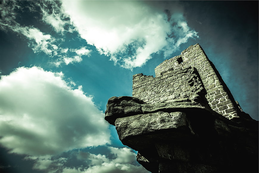 Dramatic Low Angle View of Ancient Stone Castle Ruins
