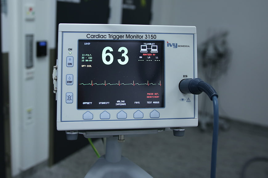 Cardiac Trigger Monitor 3150 displaying heart rate 63 in hospital setting
