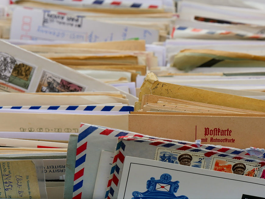 Vintage Airmail Envelopes And Postcards In A Collector's Stack