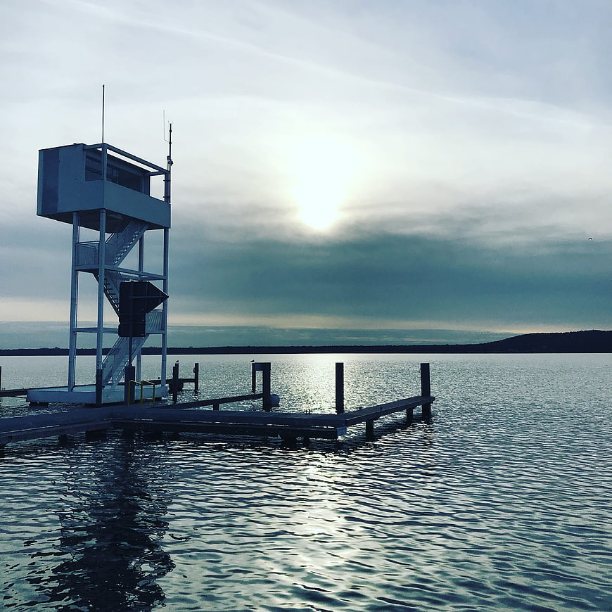 Solitary Watchtower on Wooden Pier at Dawn