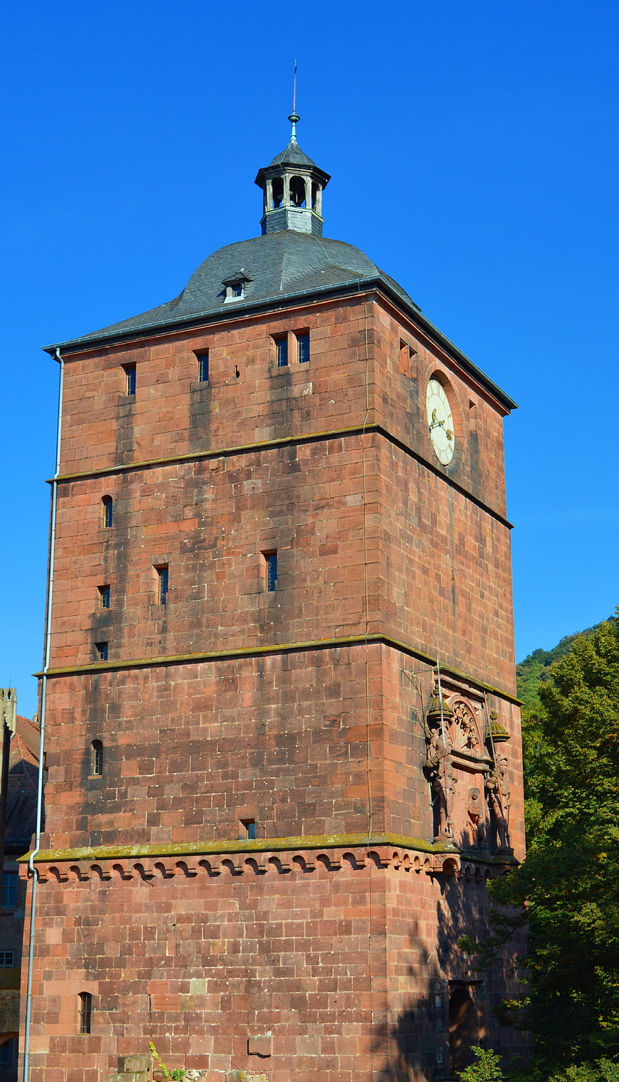 Historic Red Sandstone Clock Tower in Heidelberg, Germany