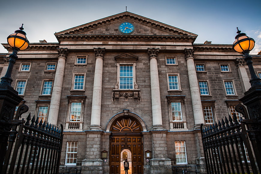 Grand Classical University Building with Clock and Iron Gates