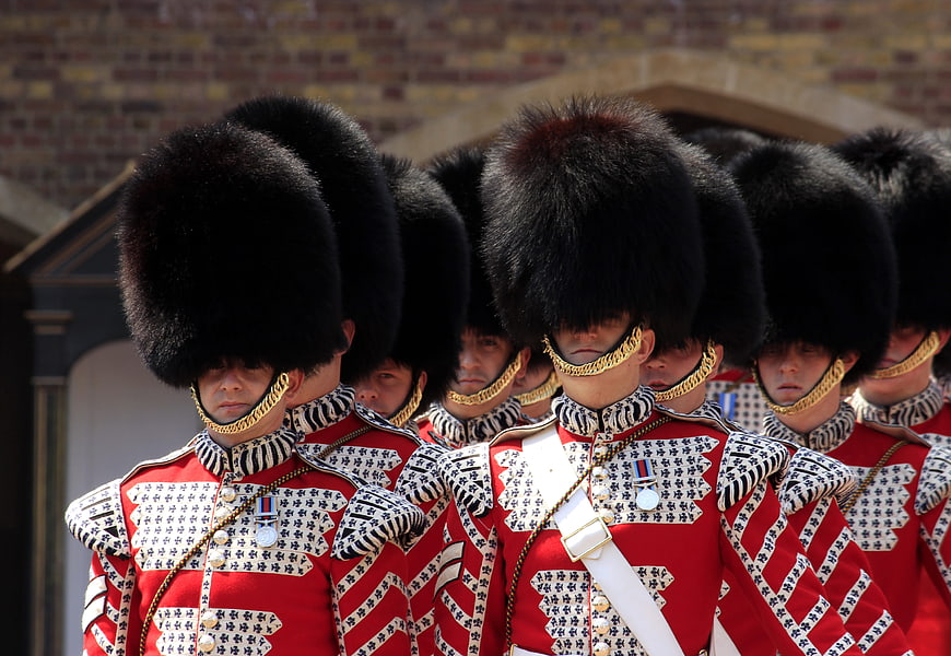 British Royal Guards in Traditional Red Uniforms and Bearskins