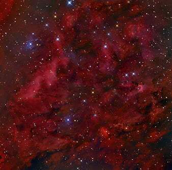 Red cosmic nebula with stars and deep space background