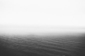 Minimalist Black and White Ocean Horizon in Fog