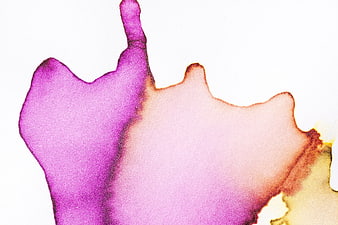 Abstract purple and pink watercolor ink wash on white background