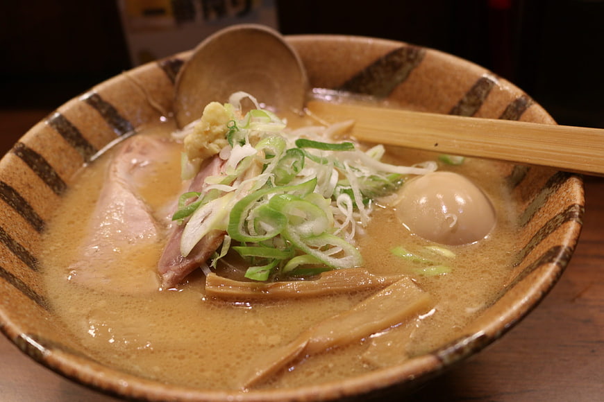 Close-up of Miso Ramen with Soft-Boiled Egg and Green Onions