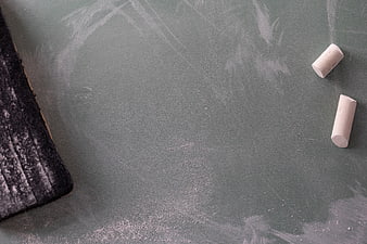 Green Chalkboard with Chalk and Eraser Flat Lay