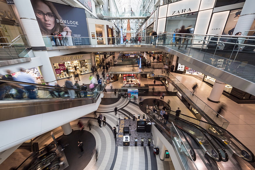High angle view of busy multi-level shopping mall interior