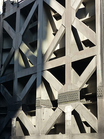 Abstract geometric steel bridge structure with rivets