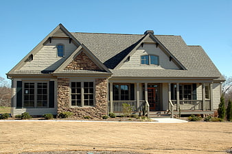 Modern suburban home with stone accents and front porch