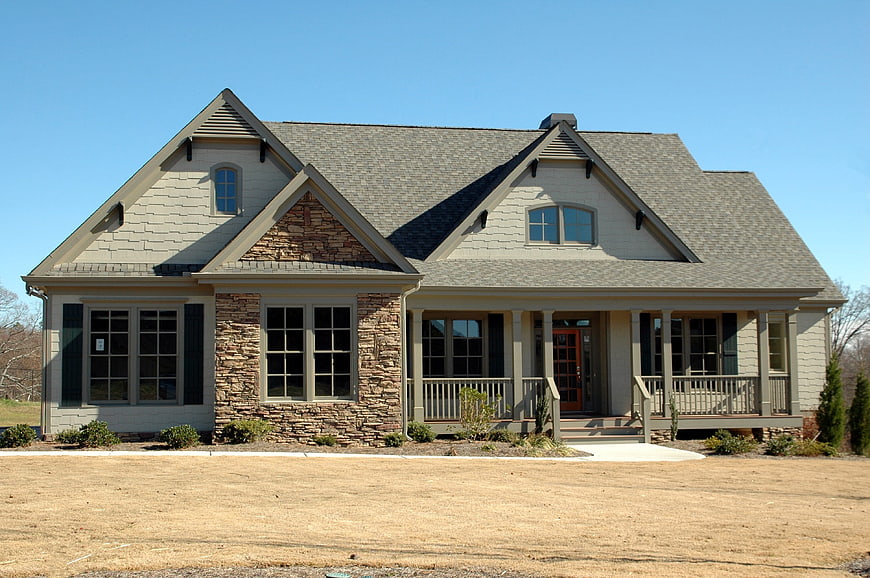 Modern suburban home with stone accents and front porch