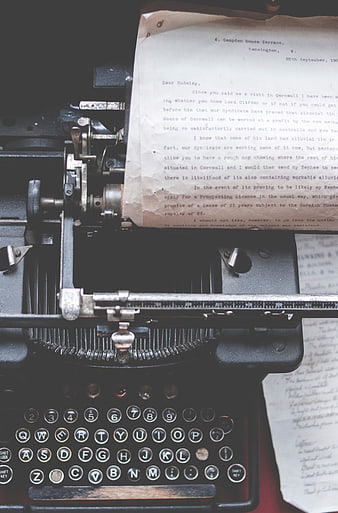 Vintage Typewriter with Old Letter and Handwritten Notes
