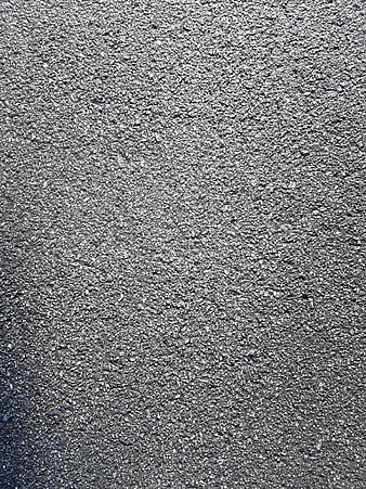 Close-up gray asphalt road surface texture background