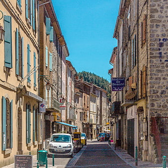 Narrow cobblestone street in a historic French village