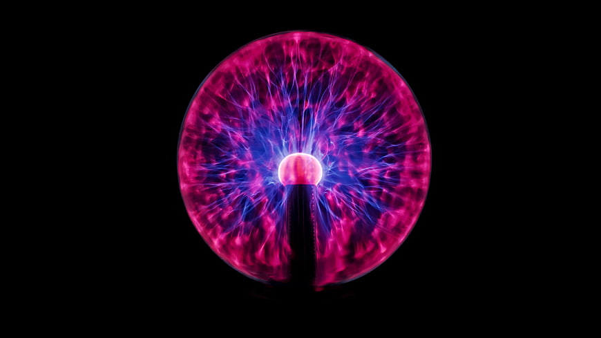 Glowing Plasma Ball with Purple and Blue Electric Lightning