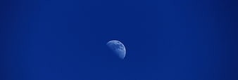 Crescent Moon in Deep Blue Sky