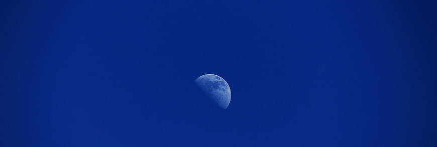 Crescent Moon in Deep Blue Sky