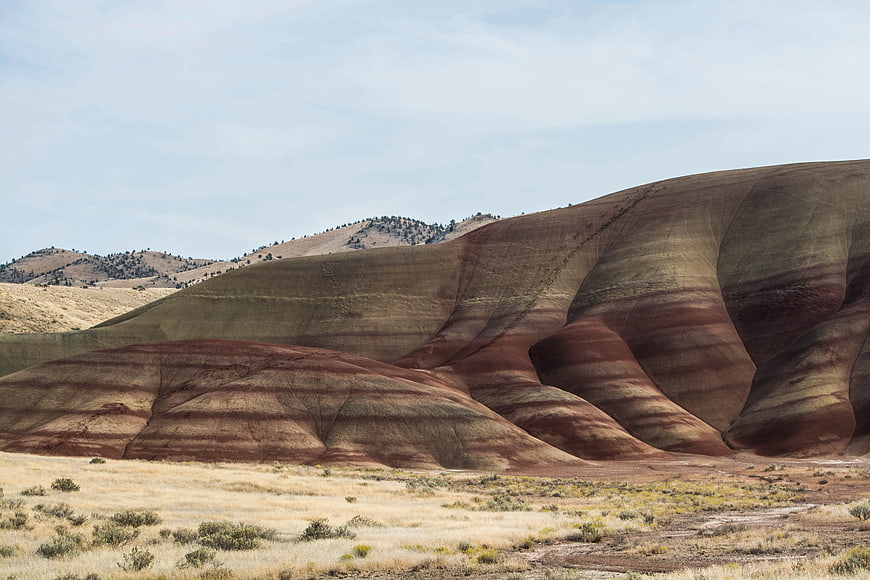 Painted Hills Badlands Landscape with Striped Erosion Patterns