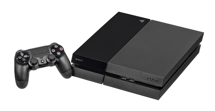 Sony PlayStation 4 Console And DualShock 4 Controller On White Background
