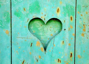Carved Heart Shape on Weathered Turquoise Wooden Planks