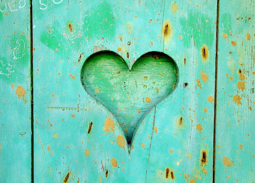 Carved Heart Shape on Weathered Turquoise Wooden Planks