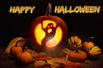 Glowing Halloween Jack-O-Lantern With Ghost Design And Autumn Leaves