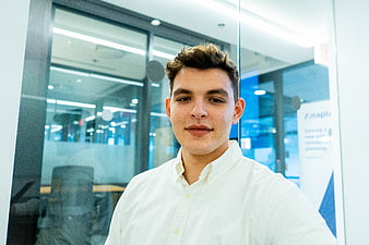Portrait of Young Professional Man in Modern Office