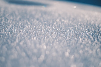 Macro Close-Up of Frost Crystals on Snow Surface