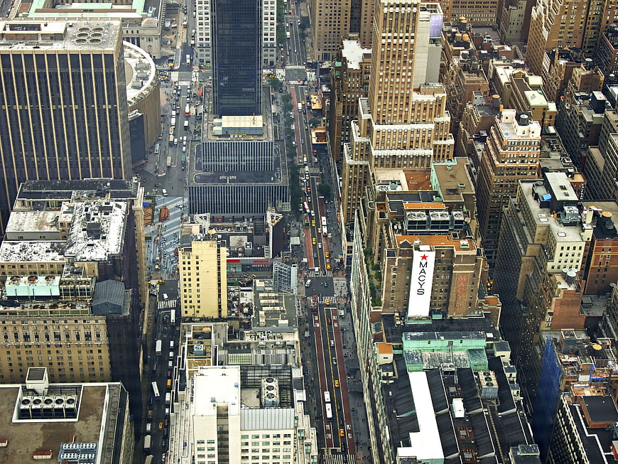 Aerial view of New York City streets and Macy's building