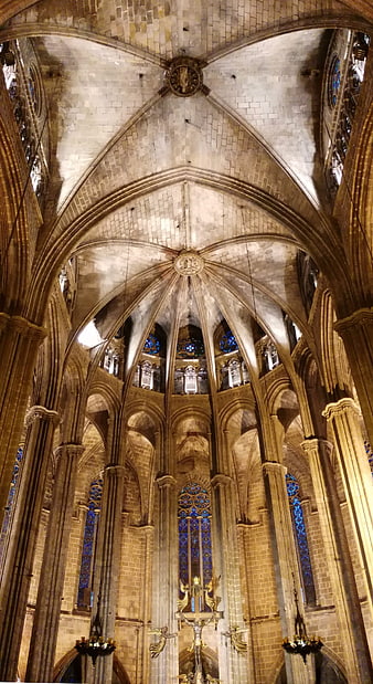 Gothic Cathedral Interior with Vaulted Ceilings and Stained Glass
