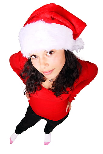 High Angle Portrait of Woman in Santa Hat and Red Sweater